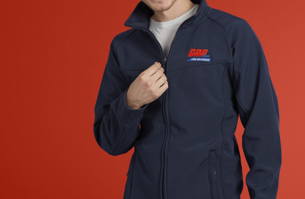 Image of man wearing company branded workwear
